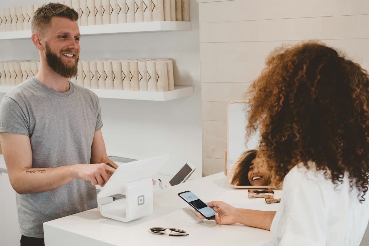 Small business owner at a shop counter